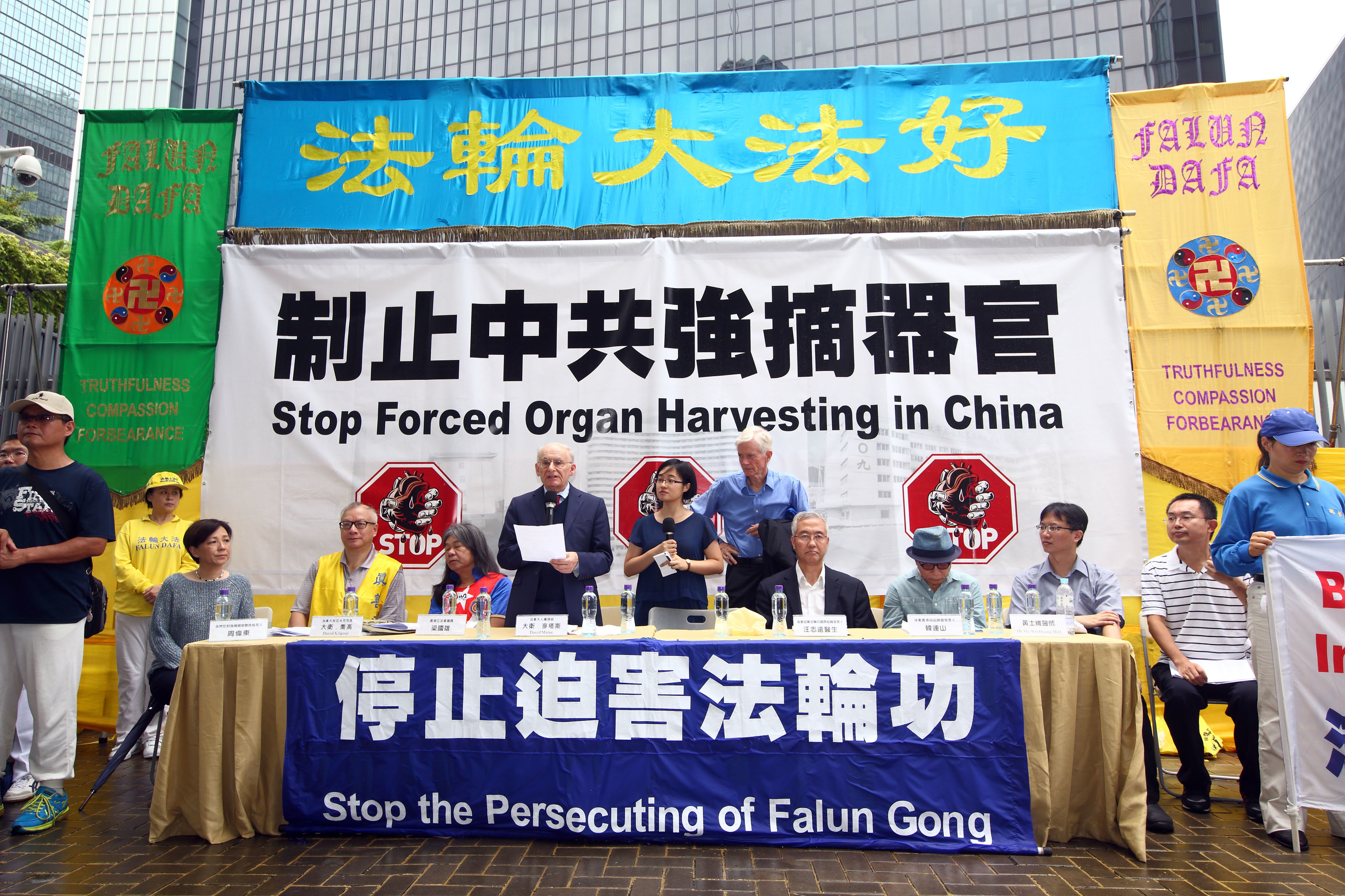 8月21日，香港部份法輪功學員趁國際器官移植協會（TTS）大會在港舉行期間舉行「全球聯動 制止強摘」集會遊行。（潘在殊/大紀元）