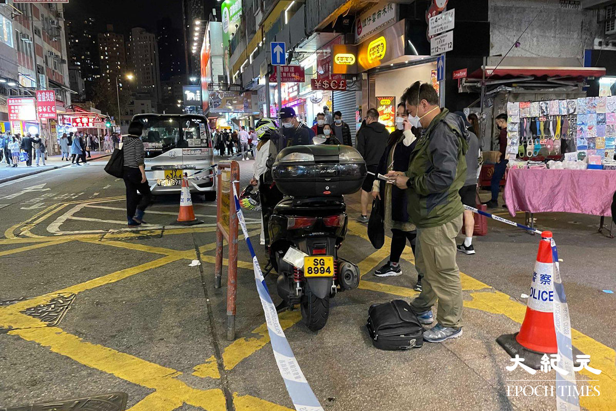 警方將事主發現失車的附近範圍封鎖，刑事偵緝檔探員到場展開調查。（卓相如／大紀元）