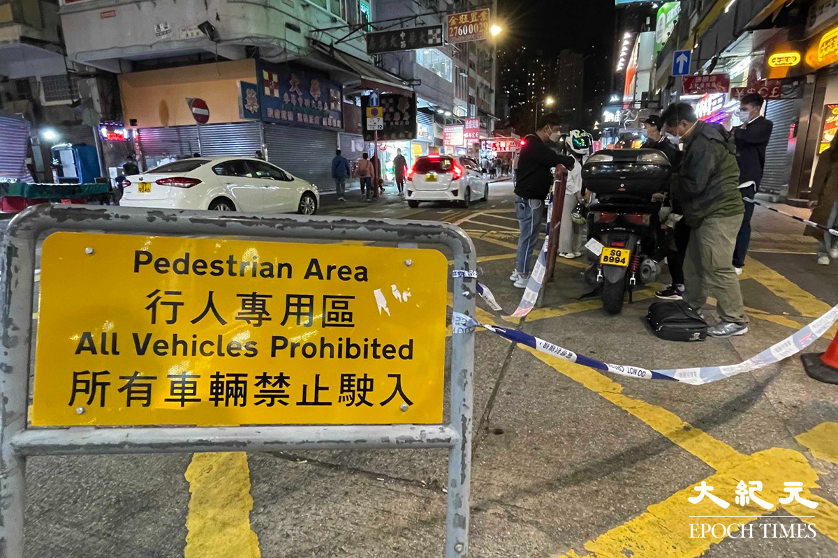警方將事主發現失車的附近範圍封鎖，刑事偵緝檔探員到場展開調查。（卓相如／大紀元）