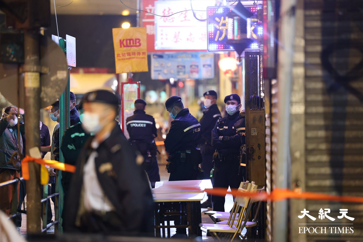 政府在晚上7時刊登憲報，將深水埗南昌街35至37號樓宇，指列為受限區域。（李辰／大紀元）